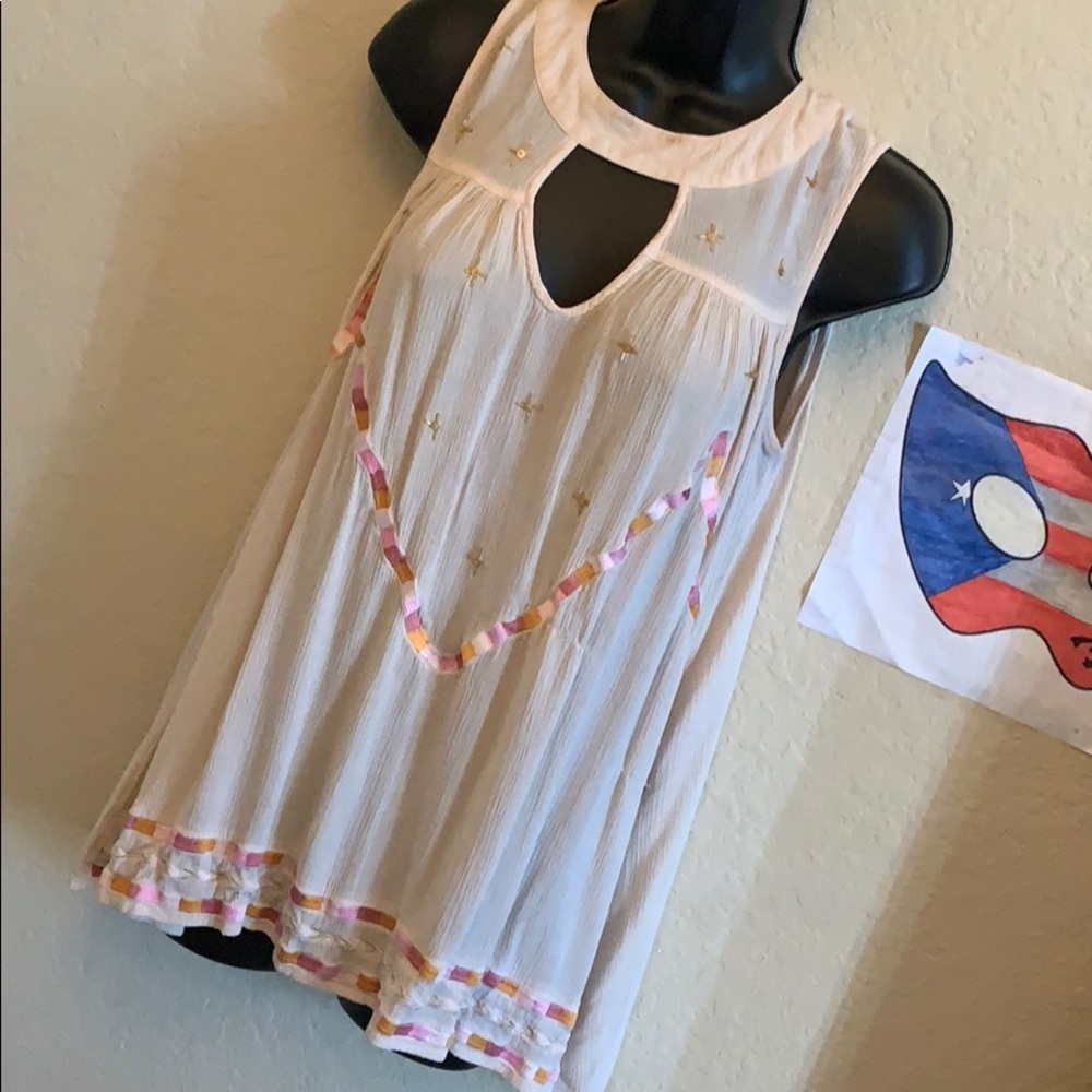 Cream Blouse with some small designs